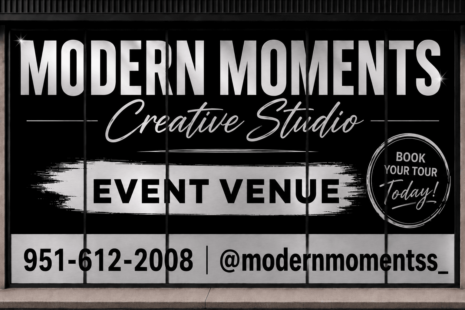 Signboard advertising Modern Moments Creative Studio event venue, contact number, and social media handle.